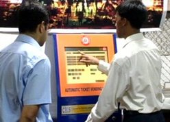 Passengers use ATVM kiosks to buy tickets at Mumbai suburban